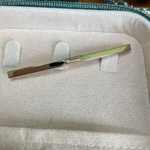 Gold tie accessory clip stay in place
